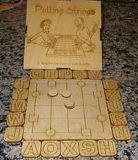 Pulling Strings Board Game - Blue Panther - Boardgames card